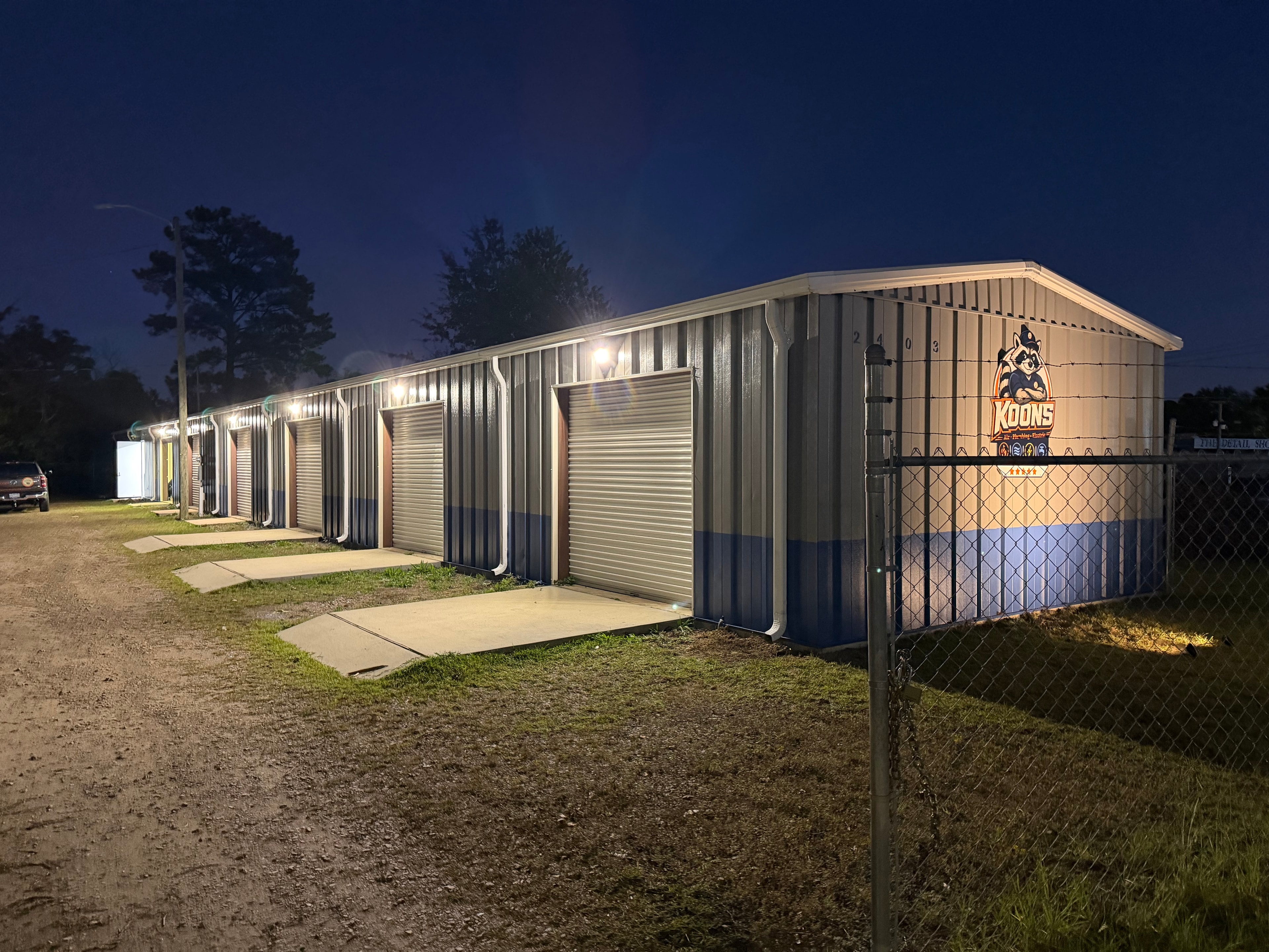 Koons Air facility lit up at night