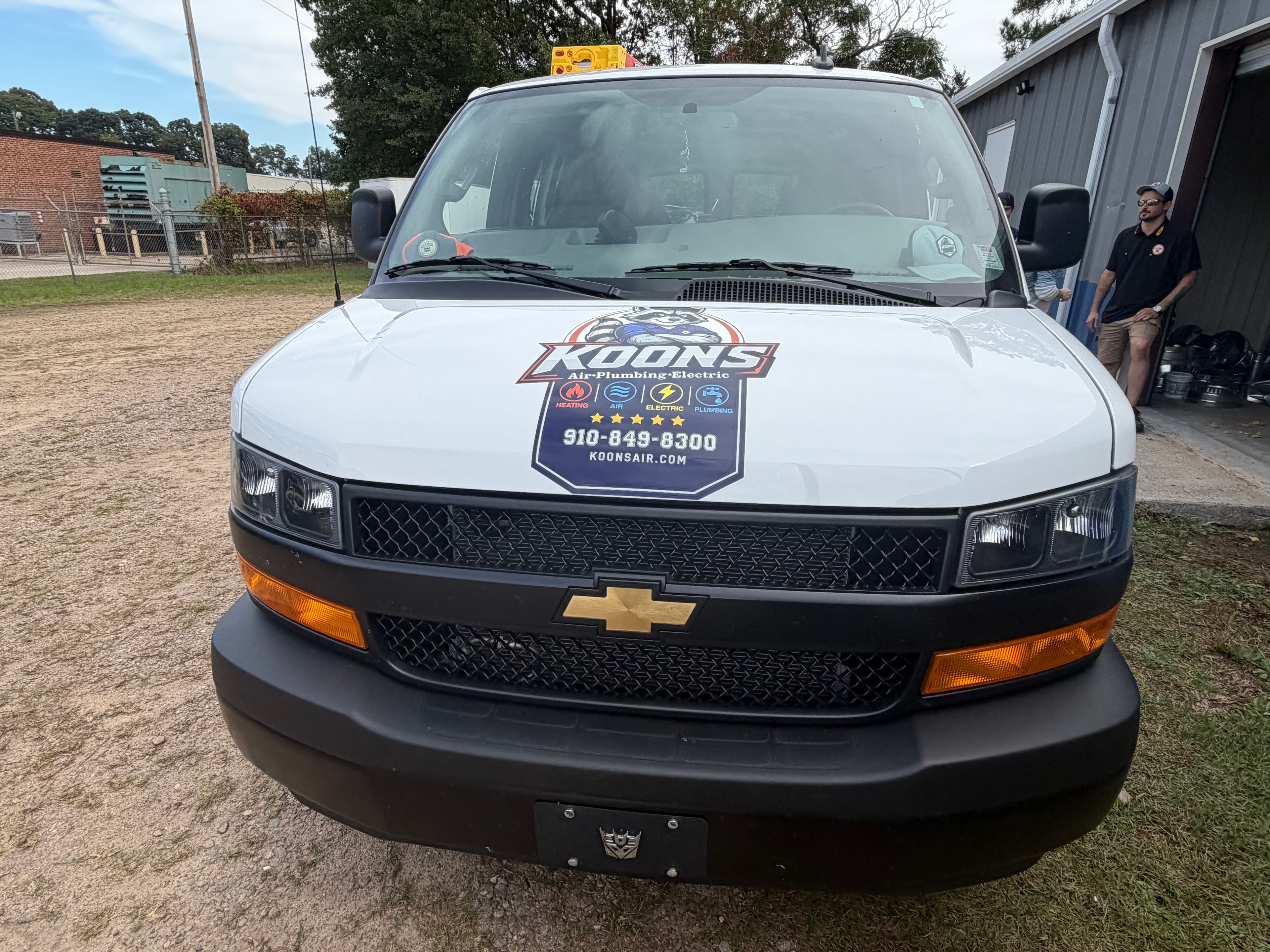 Koons Air Chevy van front view